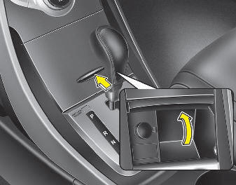 Hyundai Elantra: Multi box. To open the cover (if equipped), move the lever up then the cover will open.