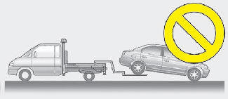 Hyundai Elantra: Towing service. CAUTION