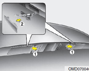 Hyundai Elantra: License plate light bulb replacement. 1. Remove the cover by pressing it as direction of the arrows.