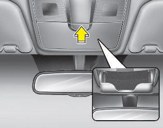 Hyundai Elantra: Sunglass holder. To open the sunglass holder, press the cover and the holder will slowly open.