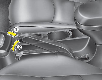Hyundai Elantra: Parking brake. To release the parking brake, first apply the foot brake and pull up the parking